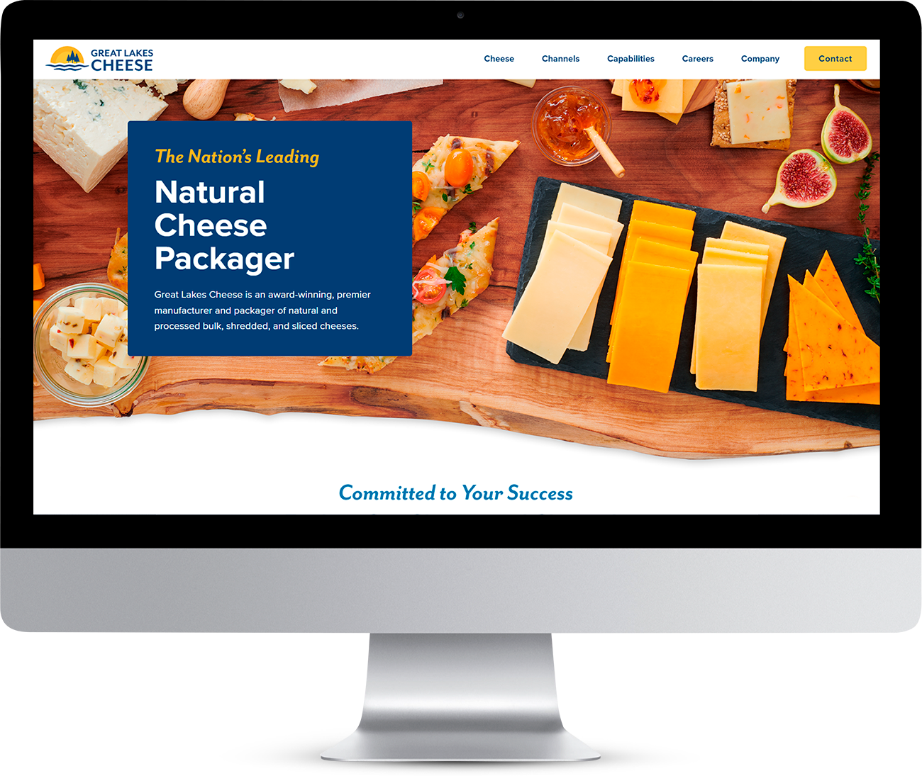 计算机监控显示大湖奶酪网站,展示奶酪片、果果和标题:国家前导自然奶酪打包机